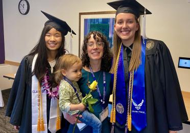 Professor Liz Hochberg and two of our graduates