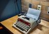 Mid-century Royal typewriter on a maple and wenge desk.